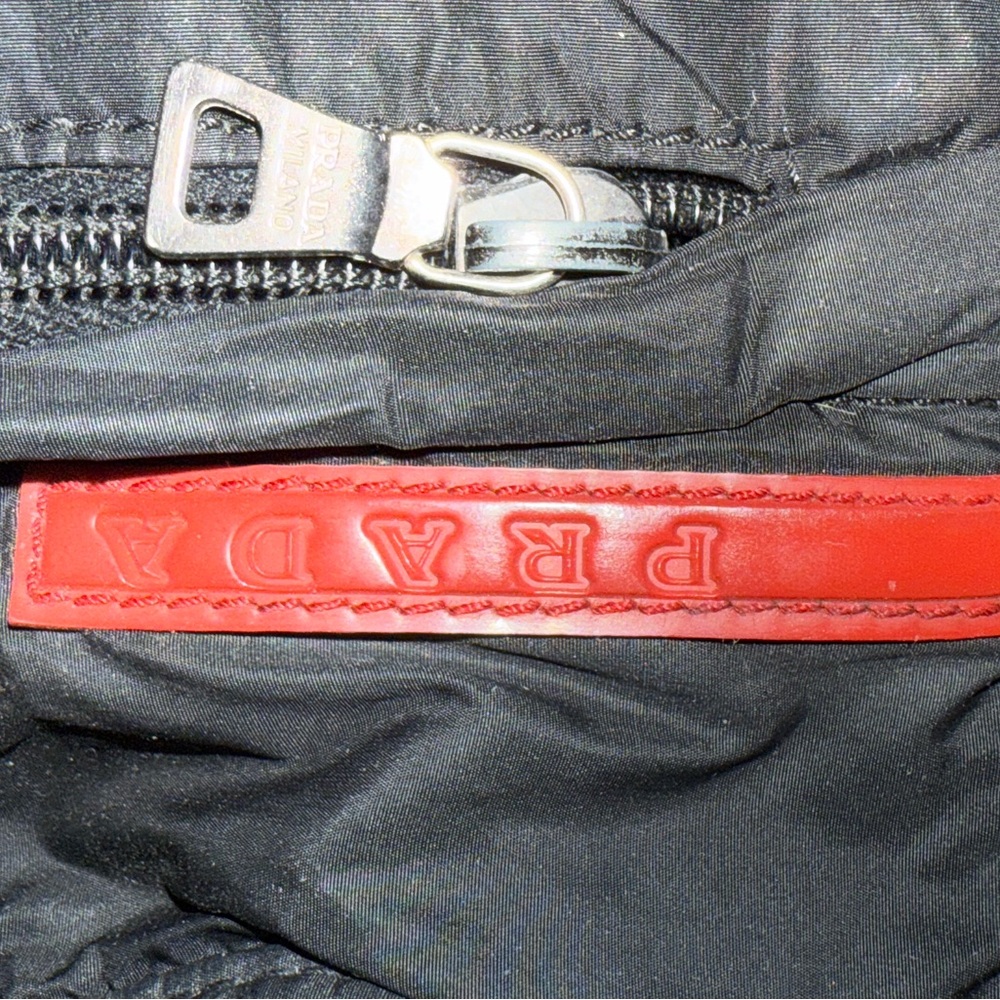 Prada Black and Red Messenger Bag with Minimalist Design - Picture 11 of 14